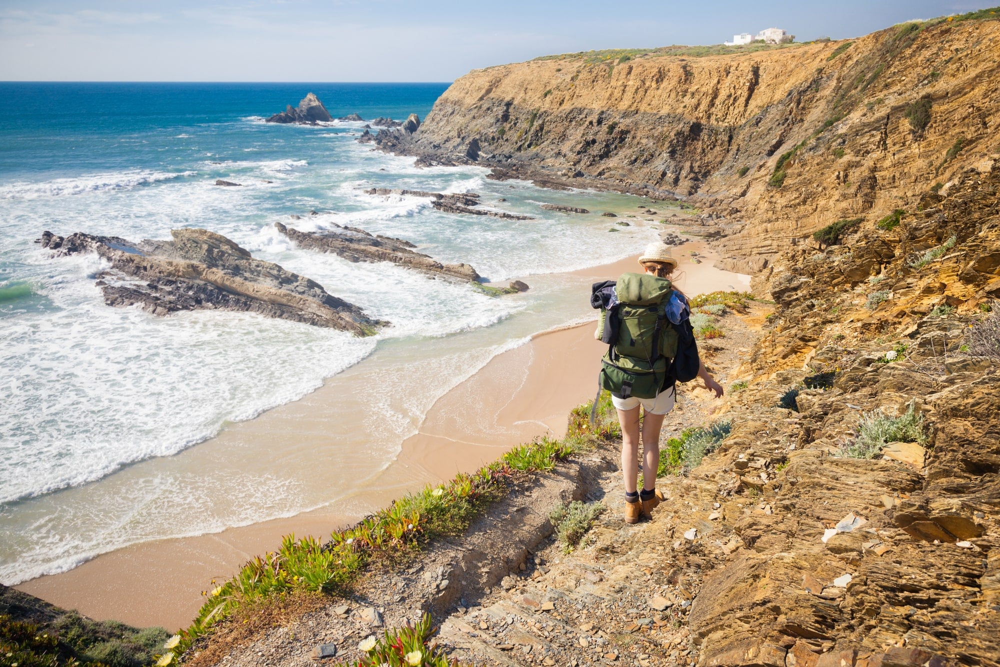 A woman hiking in the Algarve Portugal